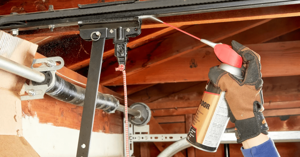 Lubricating a garage door opener track.