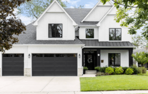 Black Garage Doors on White House Exteriors